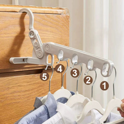 🧥📦 Foldable clothes hanger – 5 hooks, space-saving, perfect for travel!