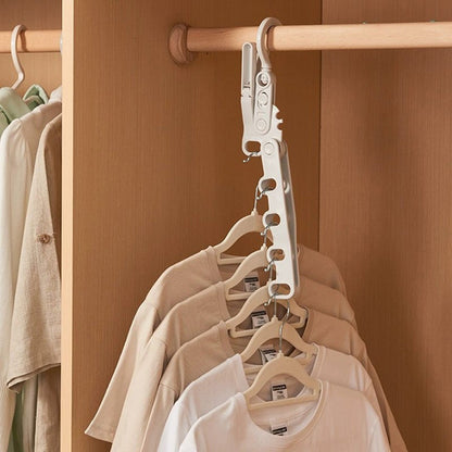 🧥📦 Foldable clothes hanger – 5 hooks, space-saving, perfect for travel!